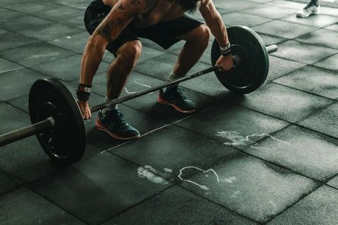 Man About To Lift Barbell in gym