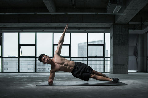 Man Doing Yoga on A Yoga Mat